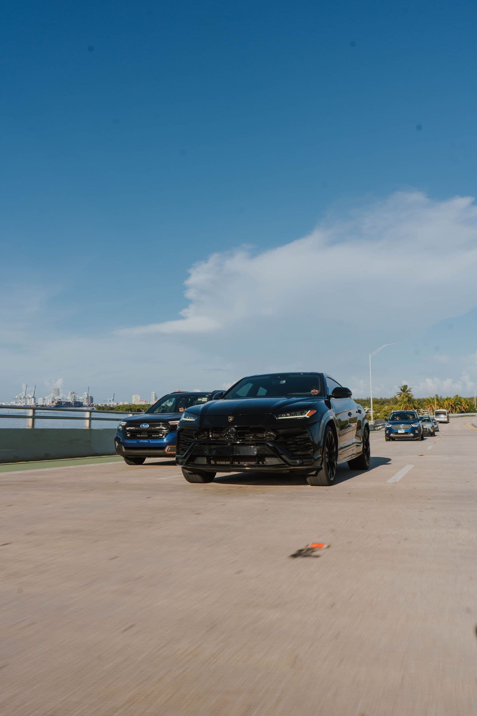 Black Lamborghini Urus on the Rickenbacker Causeway